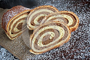Walnut Bread Roll on wooden background
