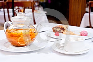 Walnut Brownies under Ice Cream with Sea-Buckthorn and Orange Tea