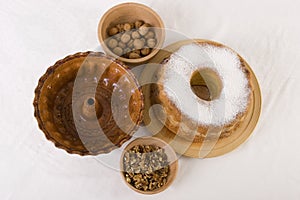 Walnut cake with nuts and crockery