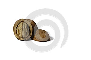 Cracked walnut on white. Walnuts Isolated on White Background. Walnut and a cracked walnut on white background.