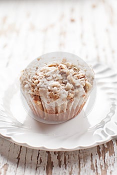 Walnut crumb sweet potato muffin on plate