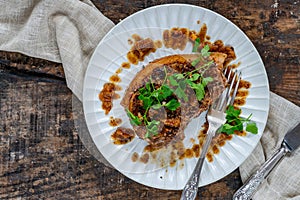 Walnut-crusted pork chop