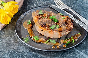 Walnut-crusted pork chop