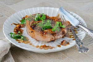 Walnut-crusted pork chop