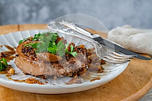 Walnut-crusted pork chop