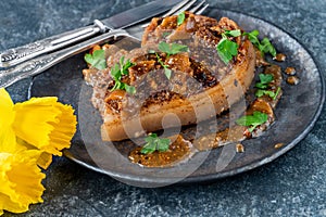 Walnut-crusted pork chop