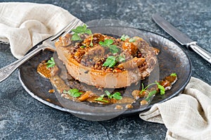 Walnut-crusted pork chop