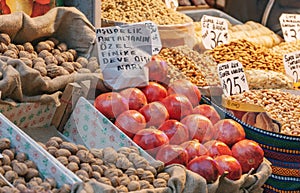 Walnut and fresh pomegranate on the counter Egyptian market. Turkey. Istanbul.