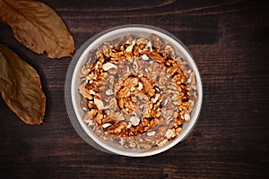 Walnut kernels in a bowl on desk