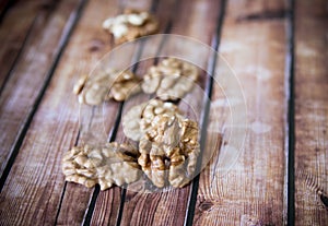 Walnut kernels on rustic old wooden table