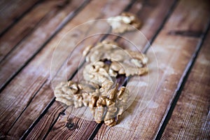 Walnut kernels on rustic old wooden table