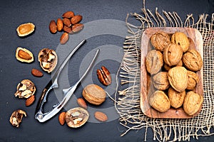 Walnut and nutcracker closeup. View from above