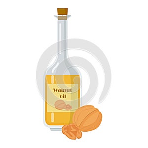 Walnut oil bottle and nuts in shell.
