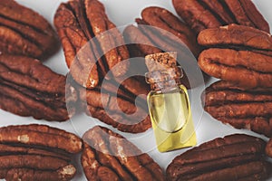 walnut oil bottle and nuts