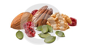 Walnut, pecan, almond nuts, green pumpkin seeds and dried cranberries isolated on white background