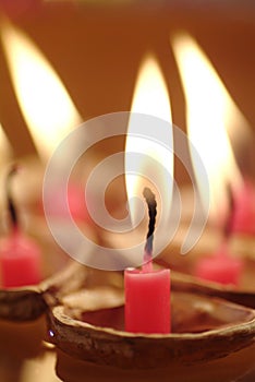 Walnut Shells with Lit up Candles