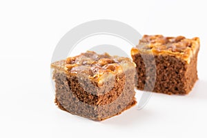 Walnut toffee cake with copy on white background