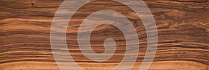 Walnut wood texture.  Natural texture background of North American walnut wood board.  Long wood plank texture.