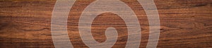 Walnut wood texture.  Natural texture background of North American walnut wood board.  Long wood plank texture.