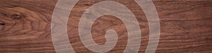 Walnut wood texture.  Natural texture background of North American walnut wood board.  Long wood plank texture.