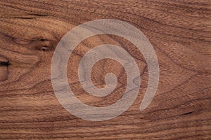 Walnut wood texture.  Natural texture background of North American walnut wood board.  Long wood plank texture. photo