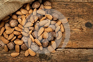Walnuts and almonds in a burlap bag