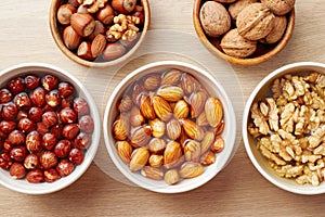 Walnuts, almonds and hazelnuts soaking in water