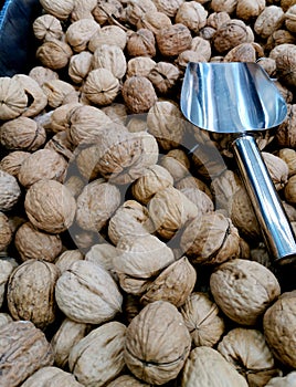walnuts in a bag with a scoop, healthy food, photo
