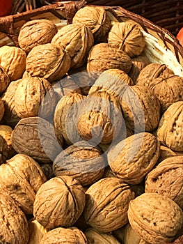 Walnuts in a basket. Close view.
