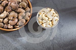 Walnuts and cashew oil on the table - Anacardium occidentale. maraÃÂ±ÃÂ³n photo