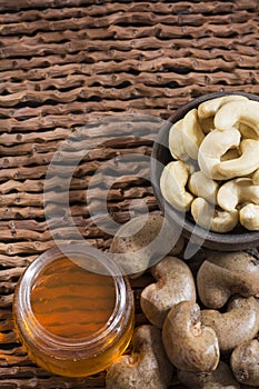 Walnuts and cashew oil on the table photo