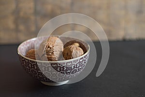 Walnuts in a chinese cup