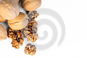 Walnuts closeup on white
