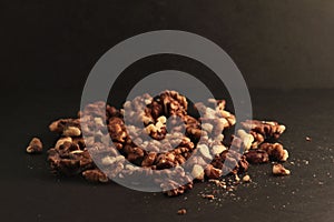 Walnuts on dark background
