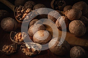 Walnuts on a dark background in a rustic style