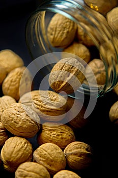 Walnuts in glass jar