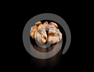 Walnuts isolated on black background