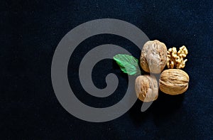 Walnuts Isolated on Black Background with copy space