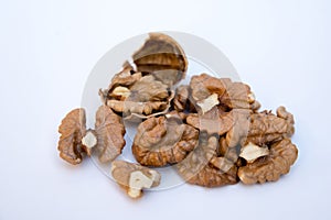 Walnuts kernels on white background. Healthy food.