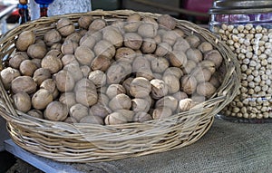 Walnuts in a large wicker basket at a bazaar in Turkey