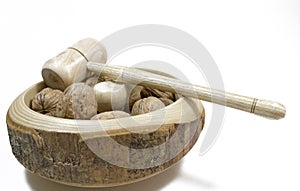 Walnuts. Nuts of walnuts with nutcracker. white backgro