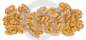 Walnuts pile top view isolated on white background. Panorama of pile walnuts without shell closeup for your design and