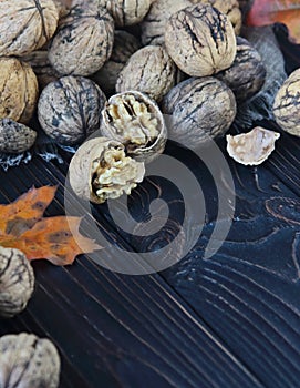 Walnuts on a rustic table, heap of walnut kernels