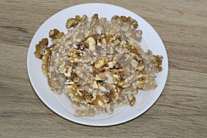 Walnuts on a white plate