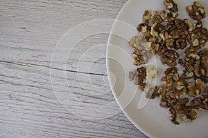 Walnuts on wooden background