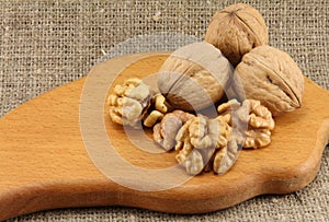 Walnuts on a wooden board (cutting board)