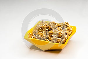 Walnuts in yellow bowl