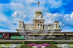 Walt Disney World Raildroad in Magic Kingdom on lightblue sky cloudy background 1