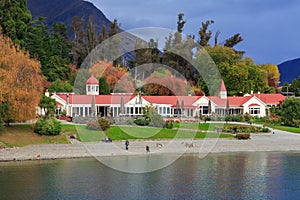 Walter Peak Farm, New Zealand. A large historic building on the shore of Lake Wakatipu