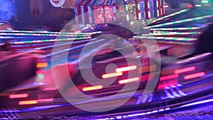 Waltzer ride funfair fairground carousel merry go round  copy space night fun entertainment rotate spinning turn stock, footage
